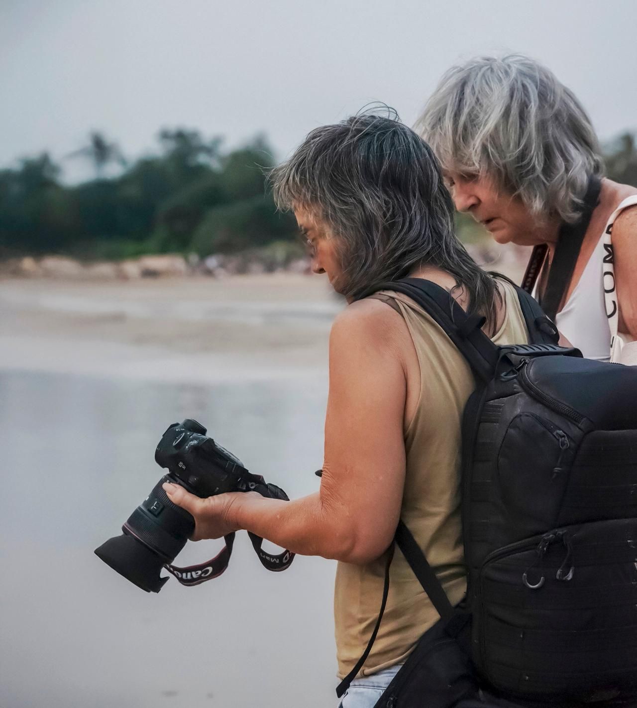 People on a Beach Learning Camera Angle — Up Here Photography in Rosebery, NT