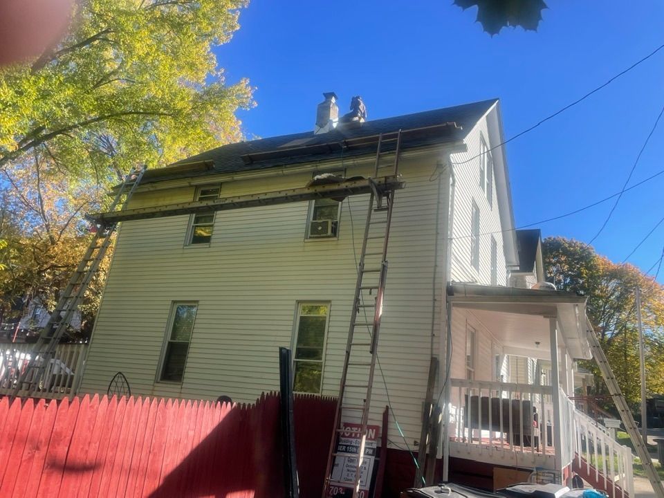 An aerial view of a large wave in the ocean.