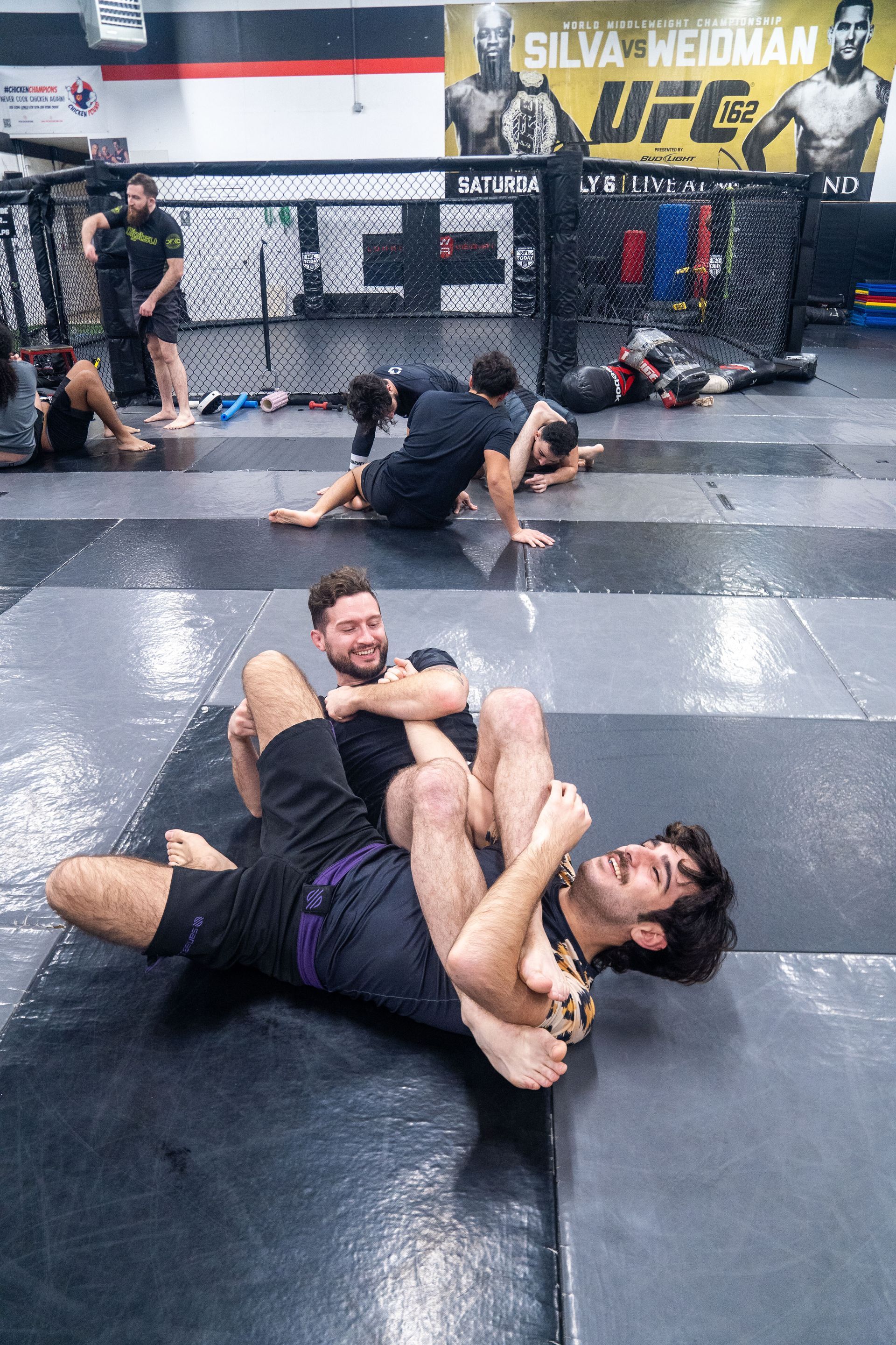 Adults training at Ray Longo MMA in Garden City NY using martial arts as an alternative to gym