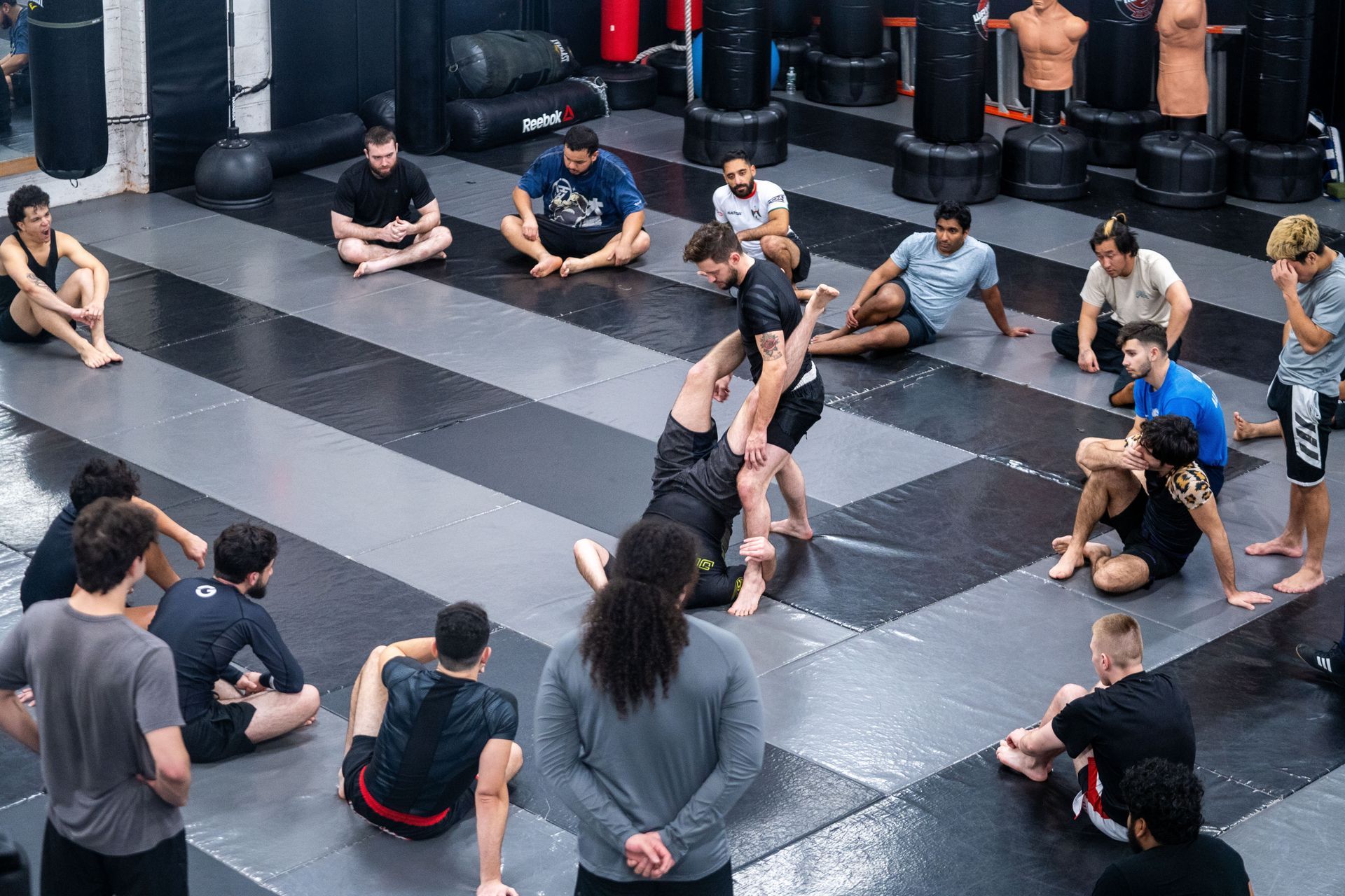 Students at Ray Longo MMA practicing martial arts to improve fitness, an learn self-defense