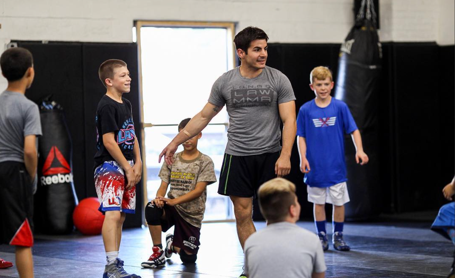 Kids practicing martial arts at Ray Longo MMA in Garden City NY for fitness, and confidence.