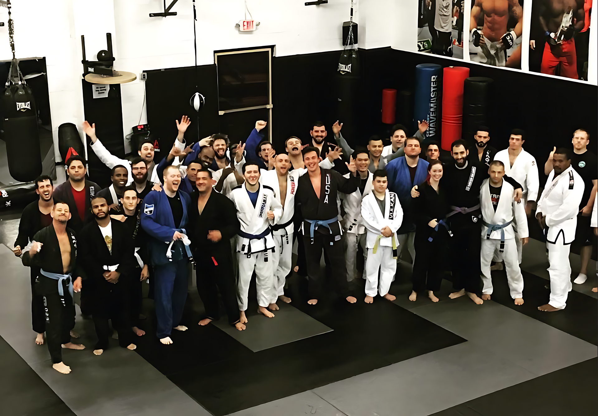 Adults practicing MMA techniques at Ray Longo's Mixed Martial Arts in Garden City NY for full-body.