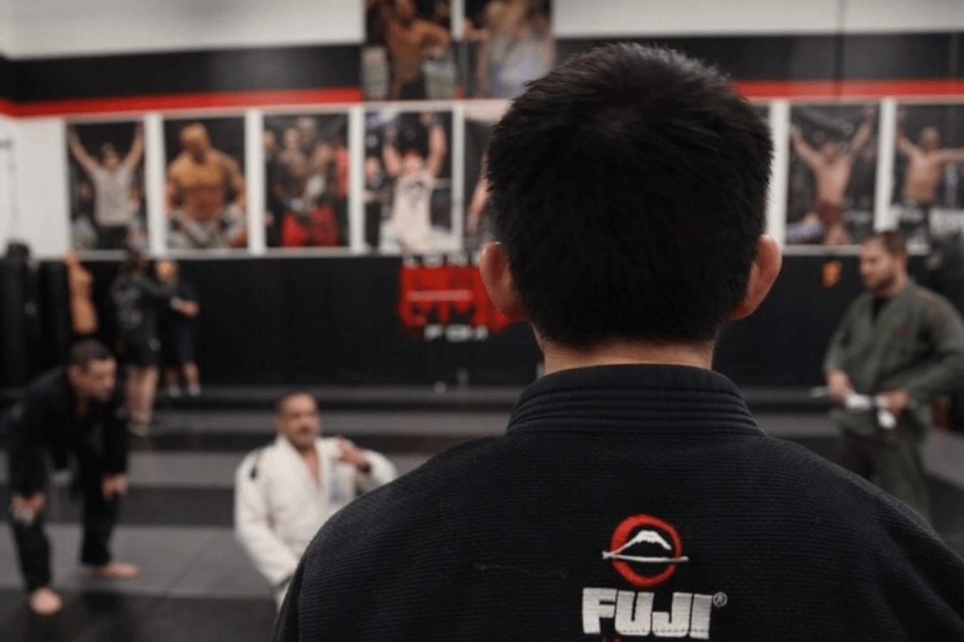 Adults practicing partner drills at Ray Longo's Mixed Martial Arts in Garden City, NY.