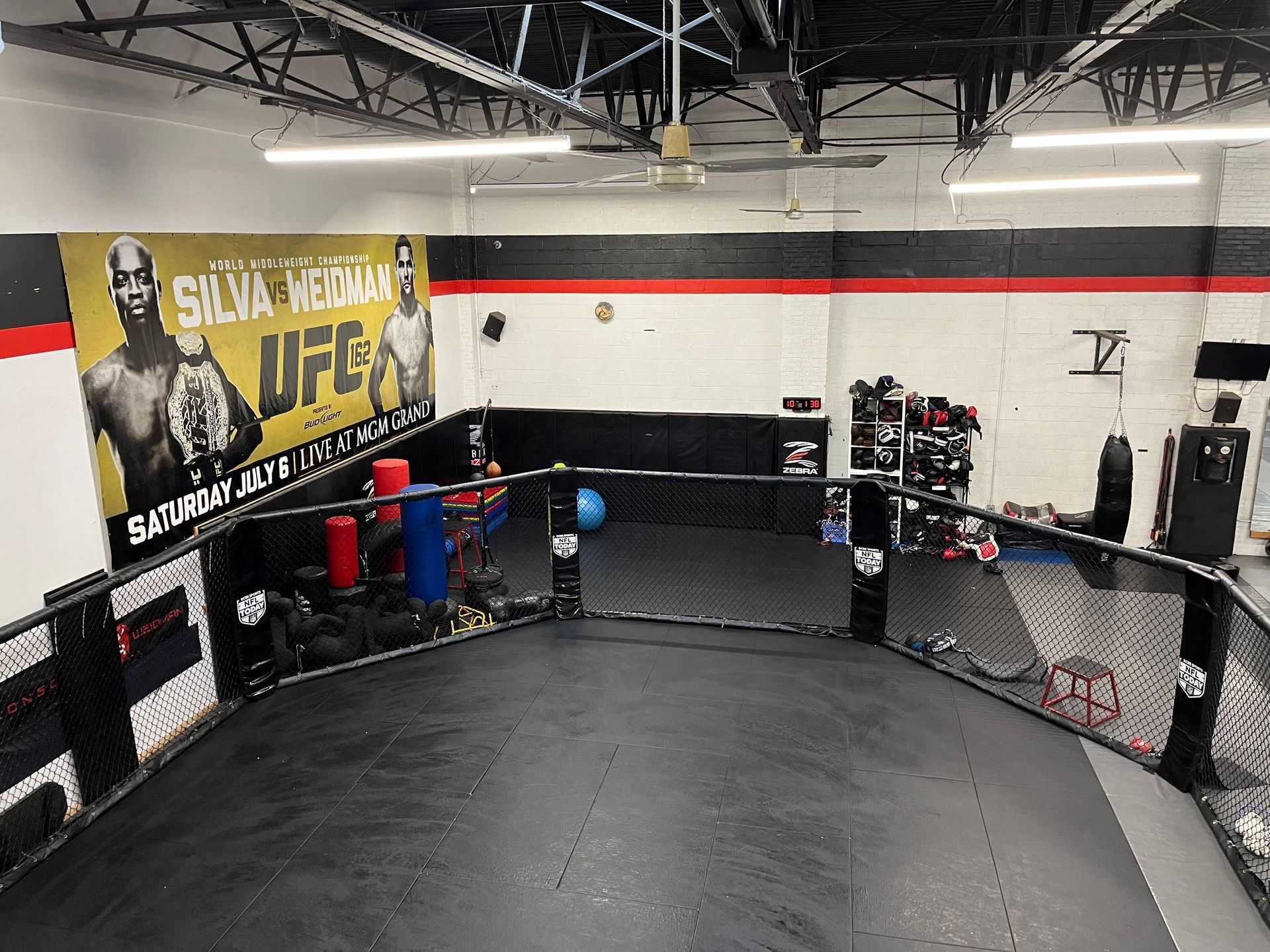 Adults training striking combinations at Ray Longo's Mixed Martial Arts in Garden City, NY.