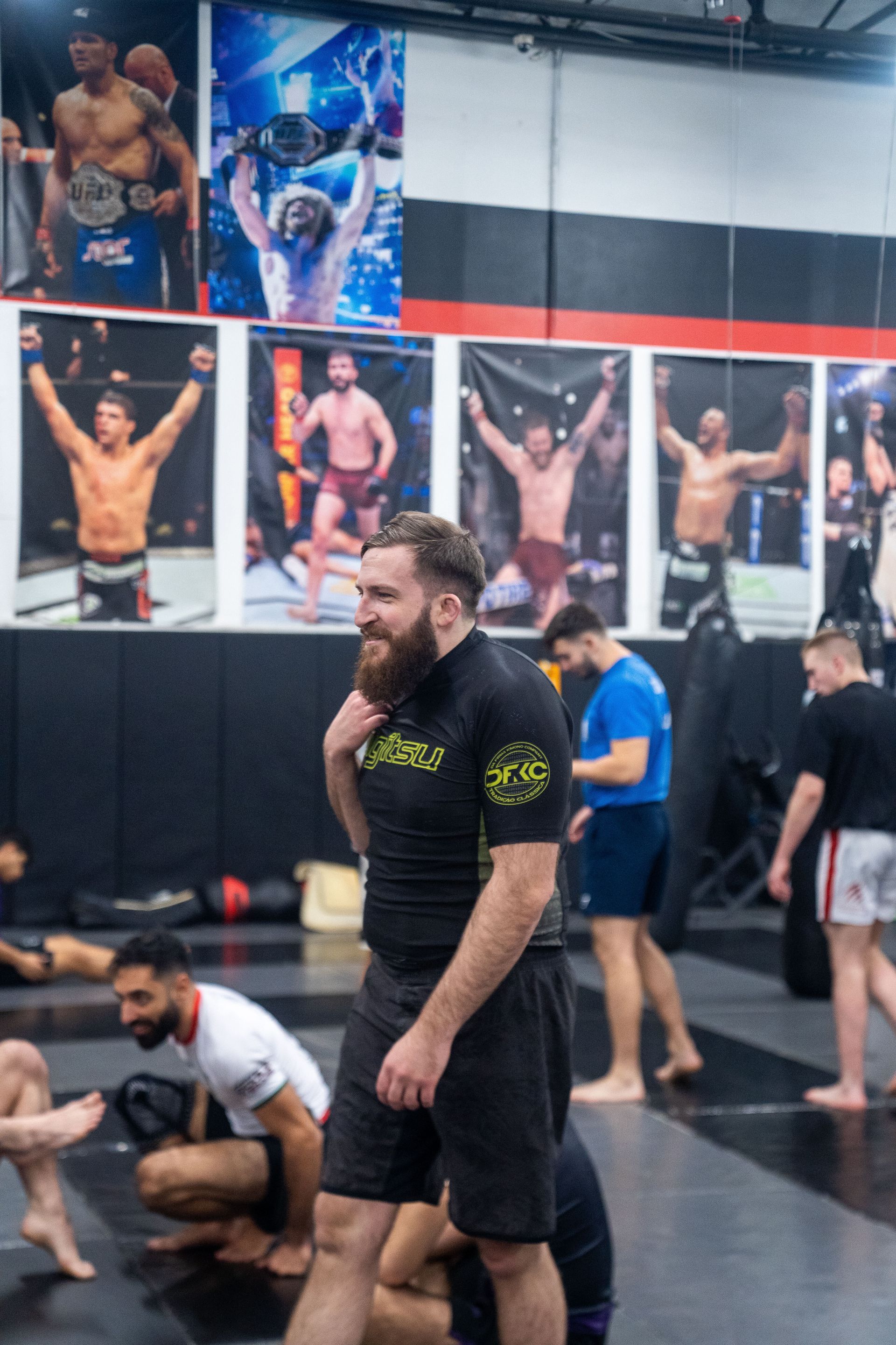 Adult students training striking and grappling at Ray Longo's Mixed Martial Arts in Garden City, NY for strength.