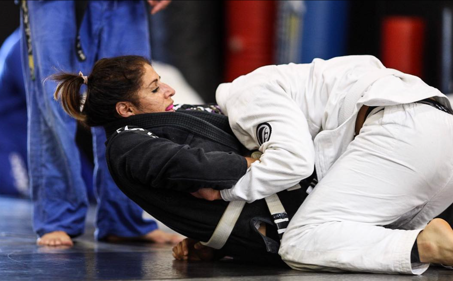 Beginners practice striking and grappling drills at Ray Longo's Mixed Martial Arts in Garden City.
