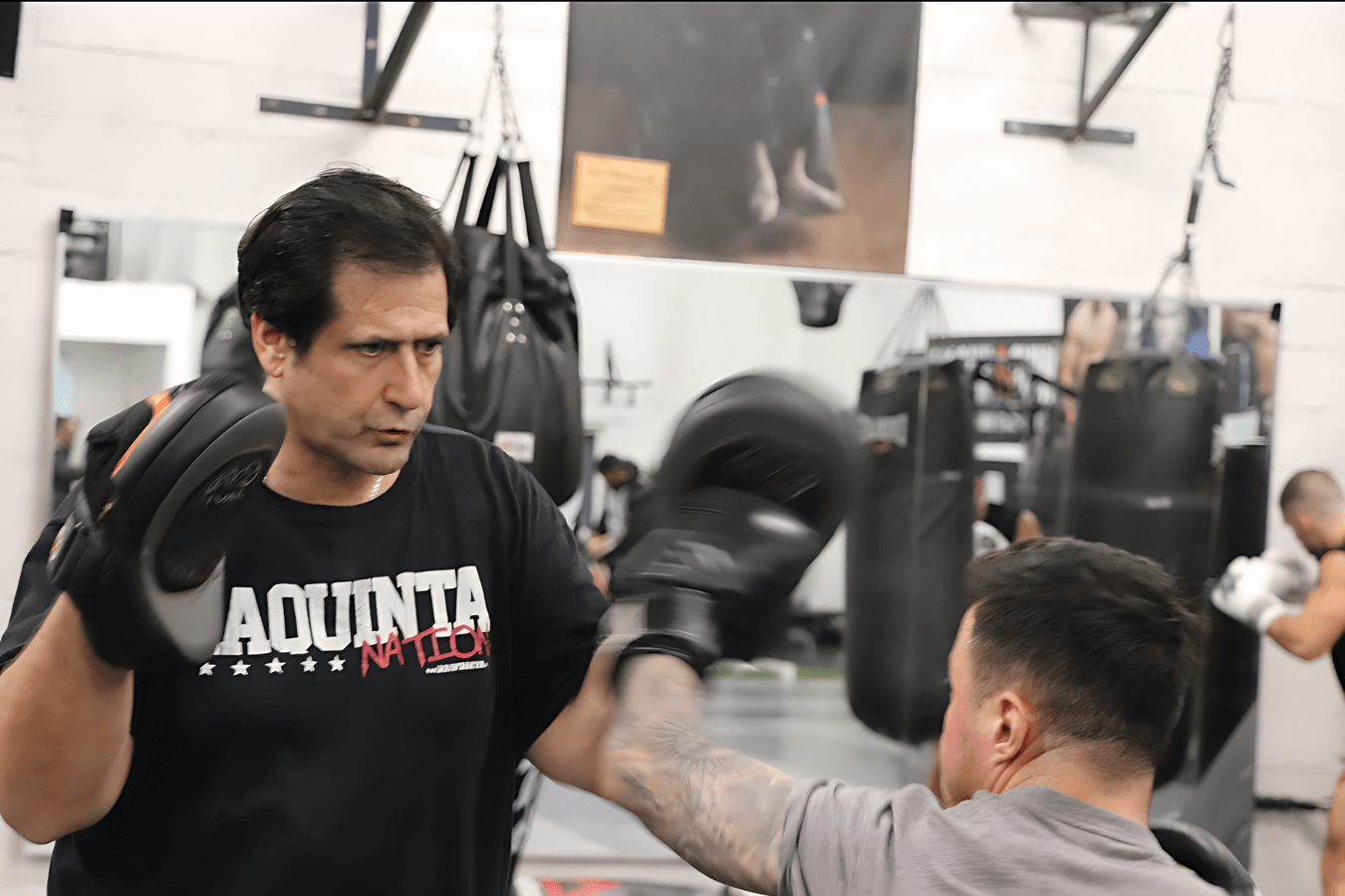 Students practicing fundamental MMA techniques during beginner classes at Ray Longo's.