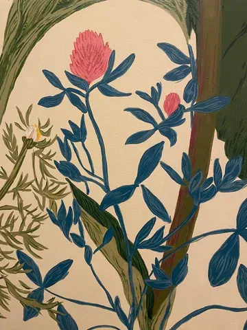 Pink clover flowers and blue-green leaves against a beige background, with green foliage.