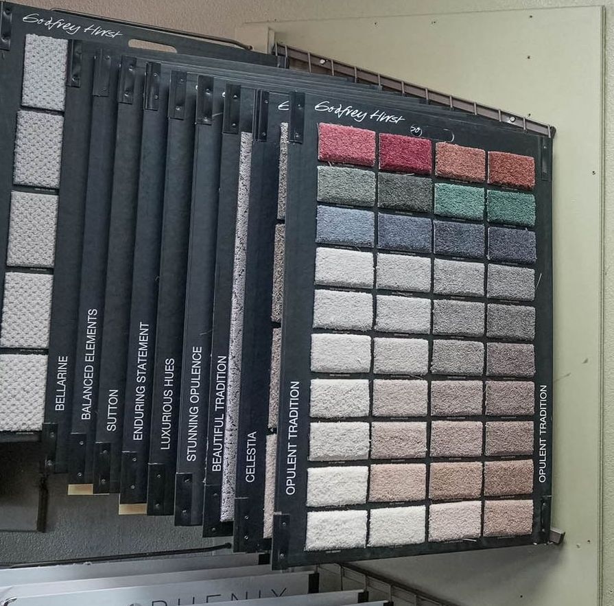 A bunch of carpet samples are stacked on top of each other