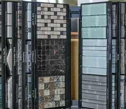 A variety of tiles are displayed in a store
