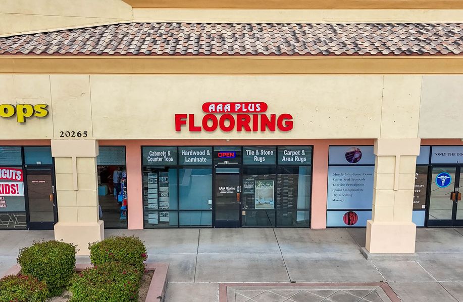 A building with a sign that says flooring on it