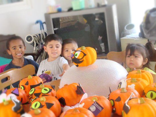 children with pumpkin crafts