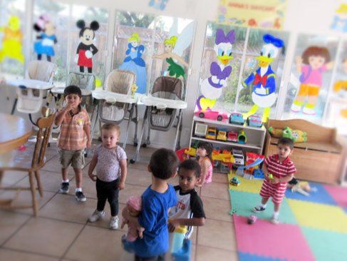 Toddlers Having Fun at Local Day Care Center