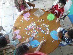 children at craft table at day care