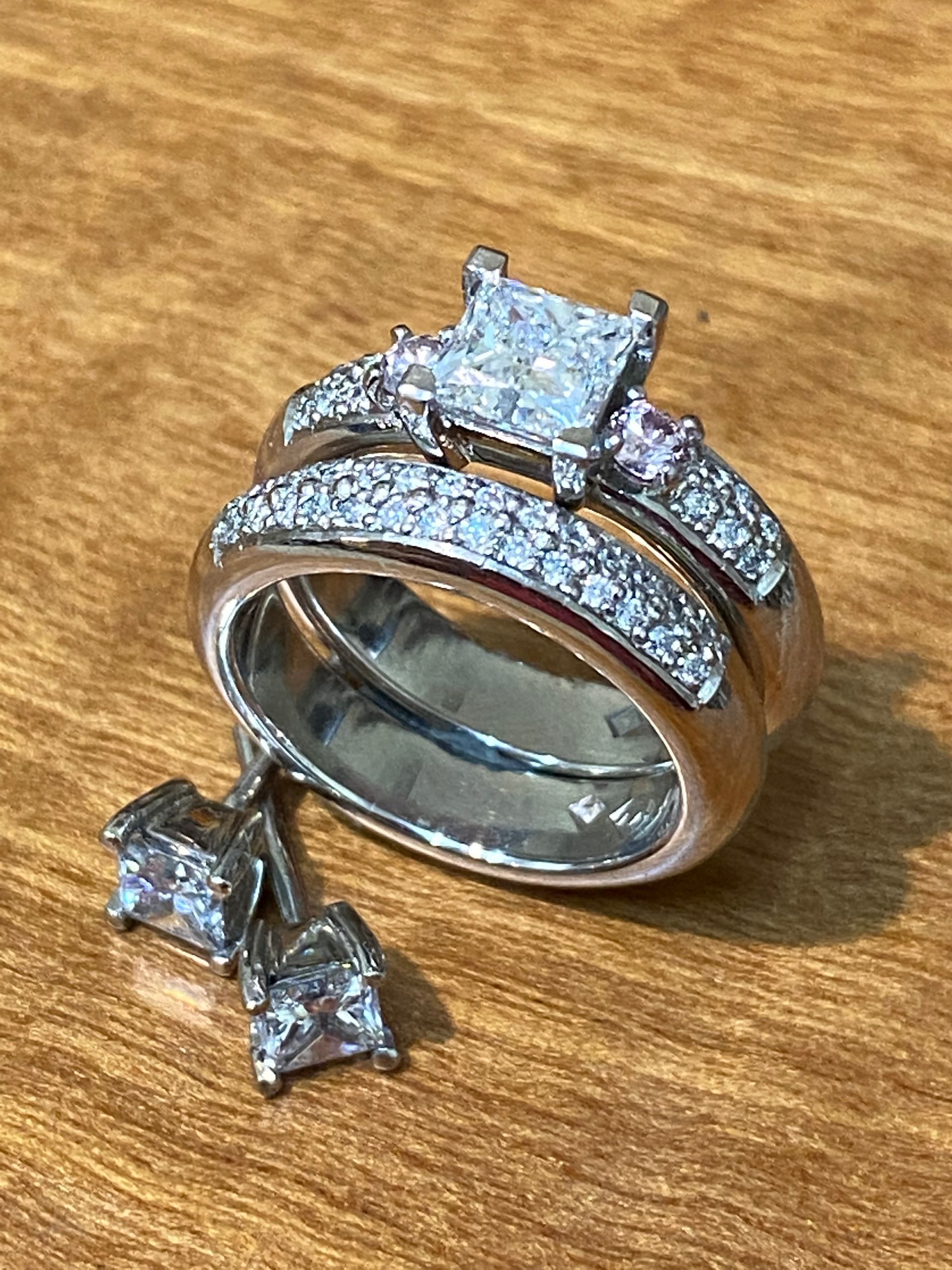 Gold Ring With Three Red Gemstones and One White Gemstone Set — Burchell's Jewellers In Wollongong, NSW