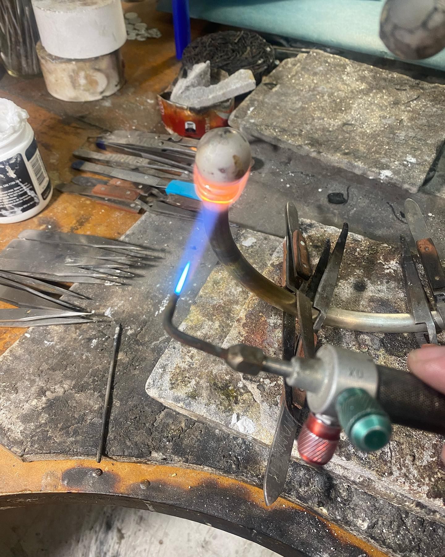 A Jeweller Using a Blow Torch On A Piece of Jewellery — Burchell's Jewellers In Bowral, NSW