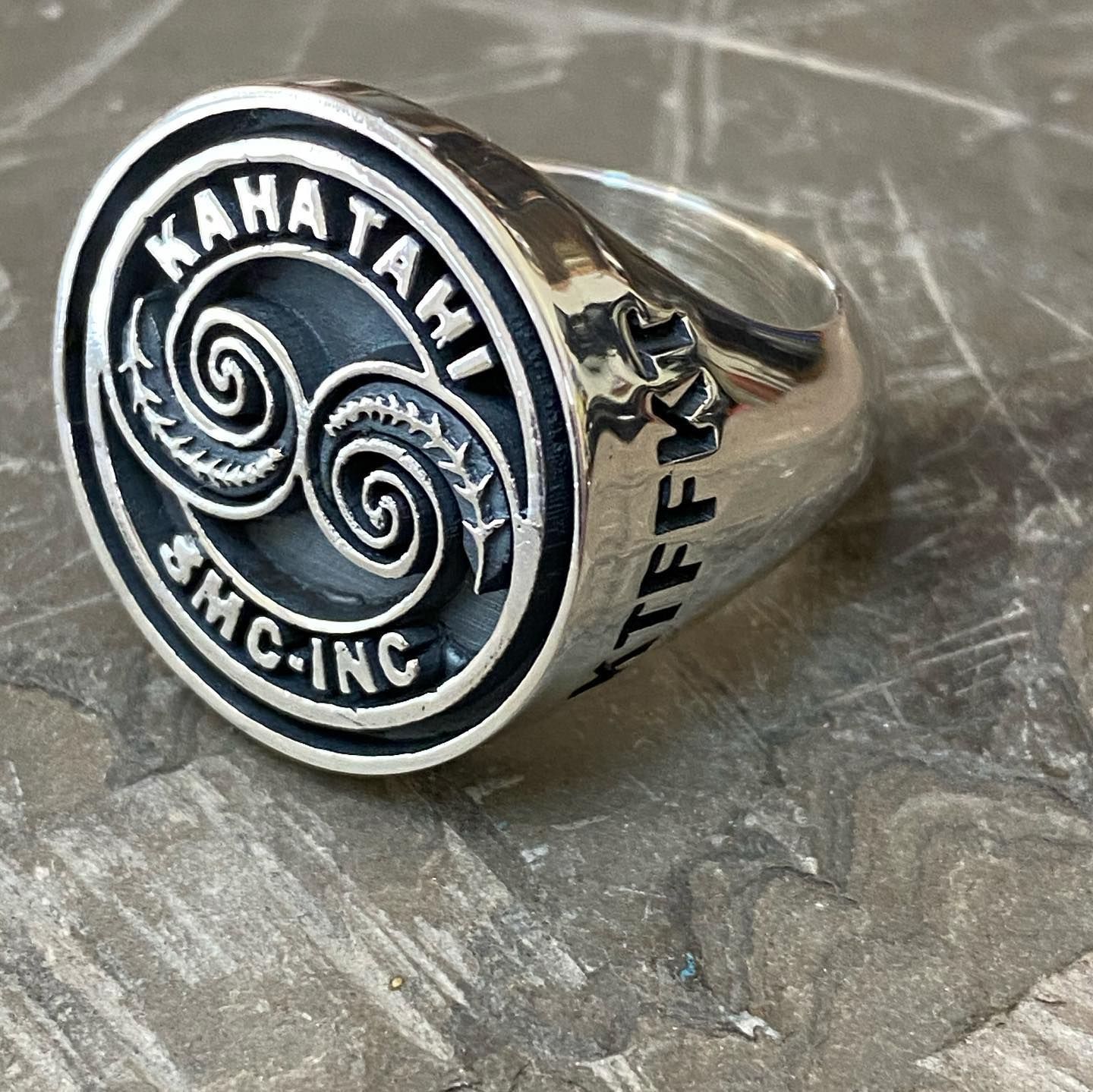 A silver ring featuring a Koru design — Burchell's Jewellers In Bowral, NSW
