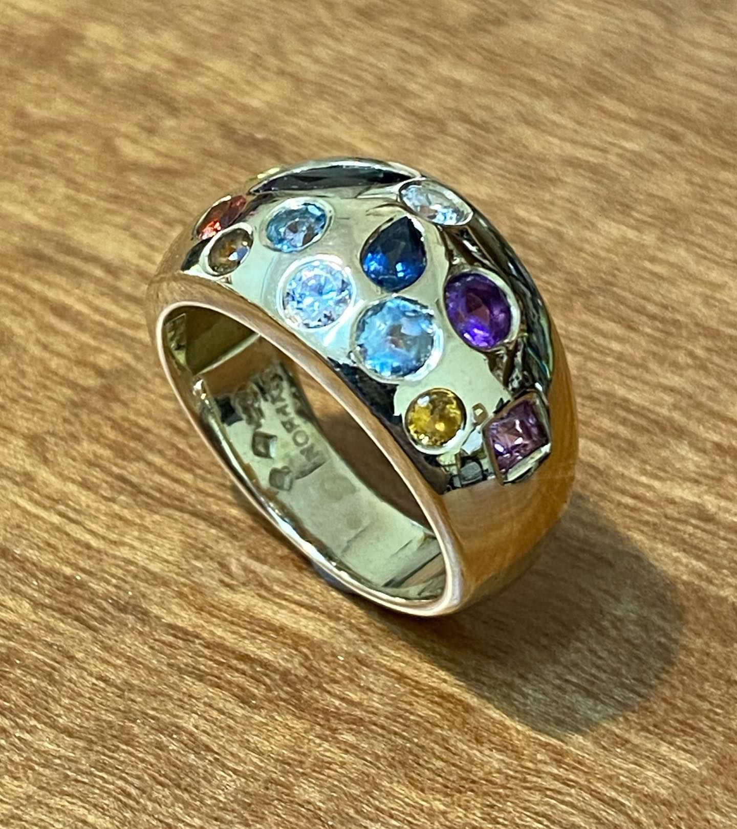 Silver Ring With Various Colourful Gemstones Set On A Dome — Burchell's Jewellers In Bowral, NSW