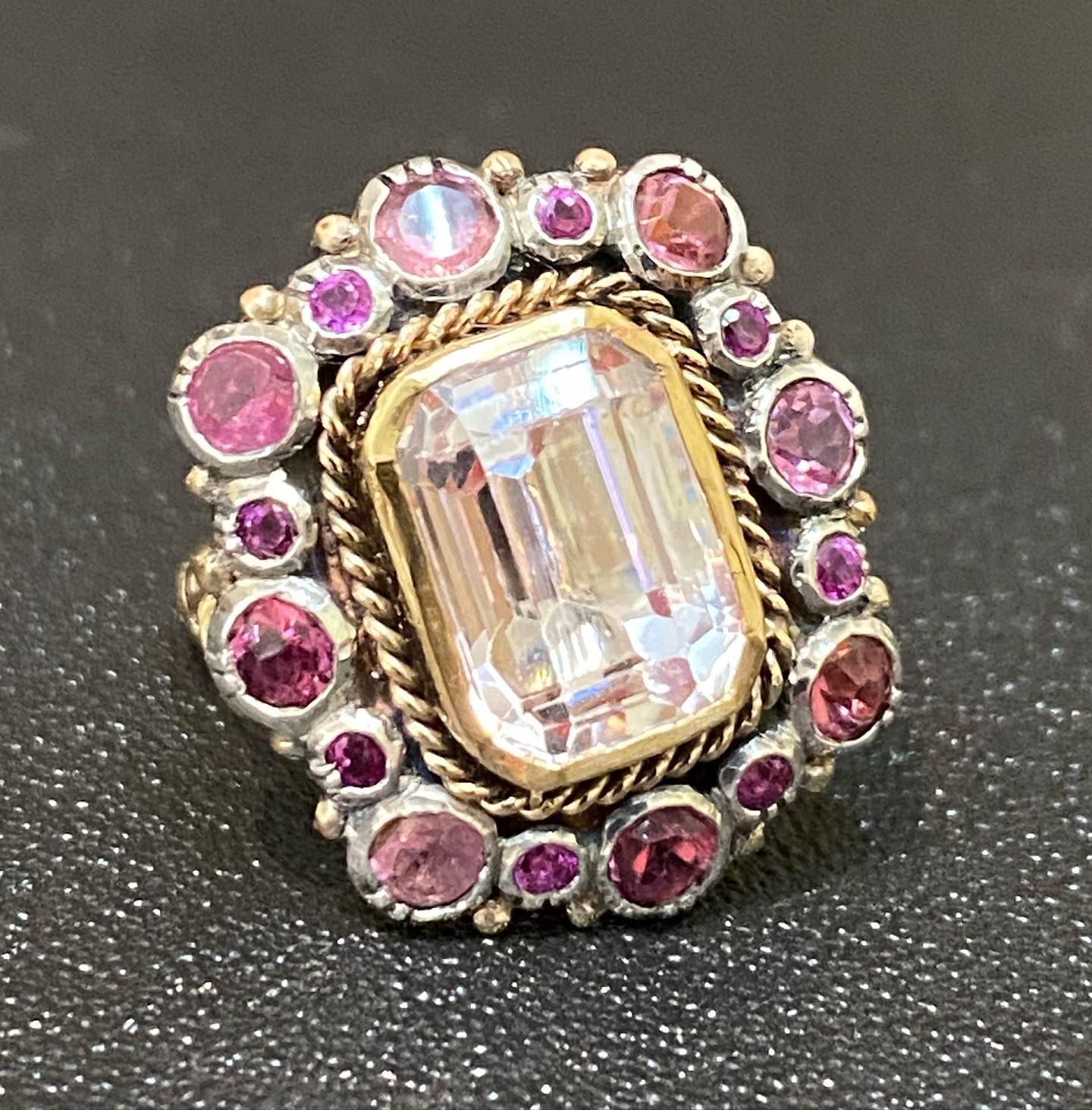 Ring With Rectangular Clear Stone Surrounded by Smaller Pink Stones — Burchell's Jewellers In Bowral, NSW