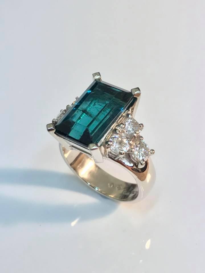 Emerald-cut Teal Gemstone Ring With Small White Gemstones — Burchell's Jewellers In Bowral, NSW