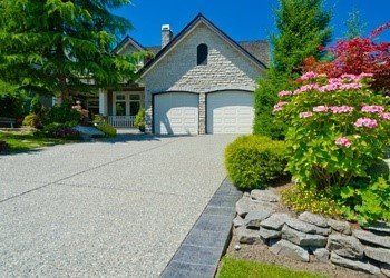 Concrete vs. Asphalt Paving: Which is Right for Your Driveway?
