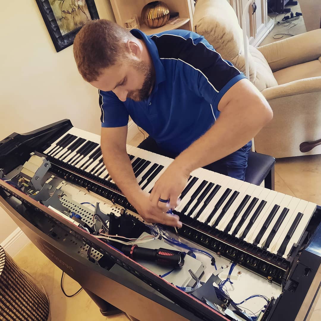 Fixing Digital Piano with Special Tools — Summerfield, FL — Florida Piano Services. LLC
