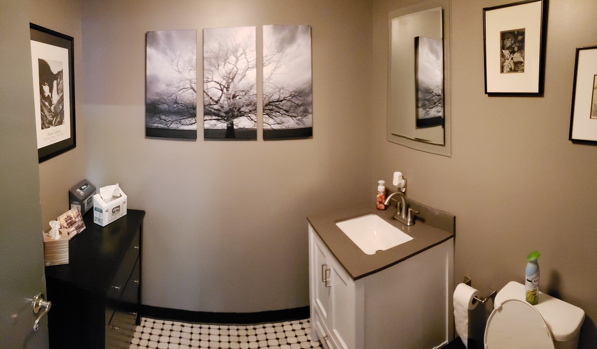 Small bathroom with grey walls | West Main Auto Repair