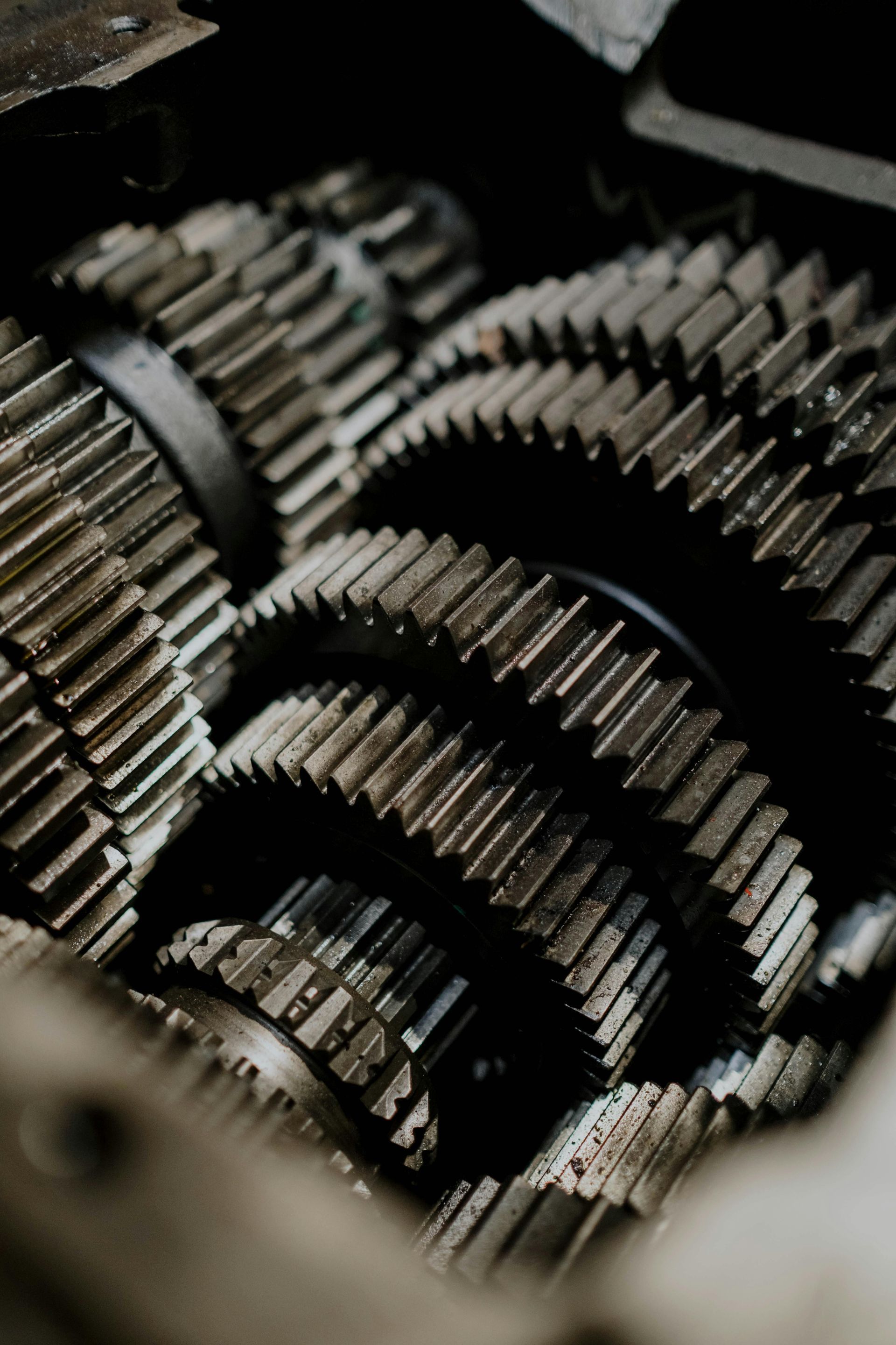 Close-up of interlocking metal gears inside a mechanical assembly