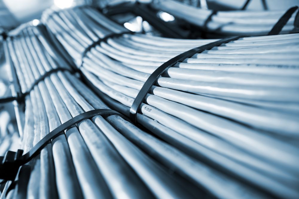 Bundles of Gray Network Cables Held Together With Black Cable Ties — Powered By JBES In Sandgate, NSW