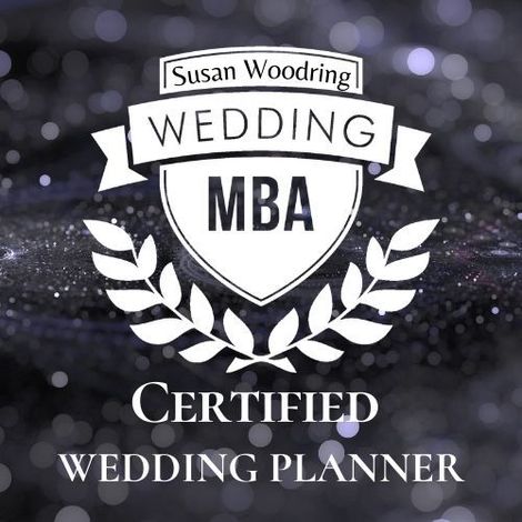 Susan Woodring Wedding MBA Certified Wedding Planner logo on dark background