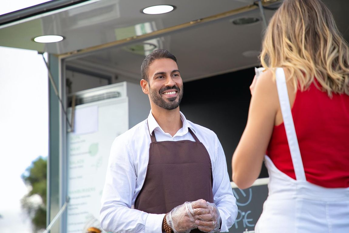 Smiling Hospitality Business Owner