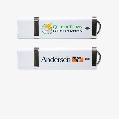 Three white card-shaped USB flash drives, one with the USB connector exposed, arranged on a gray background.