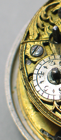 Bildausschnitt: Altes Uhrwerk