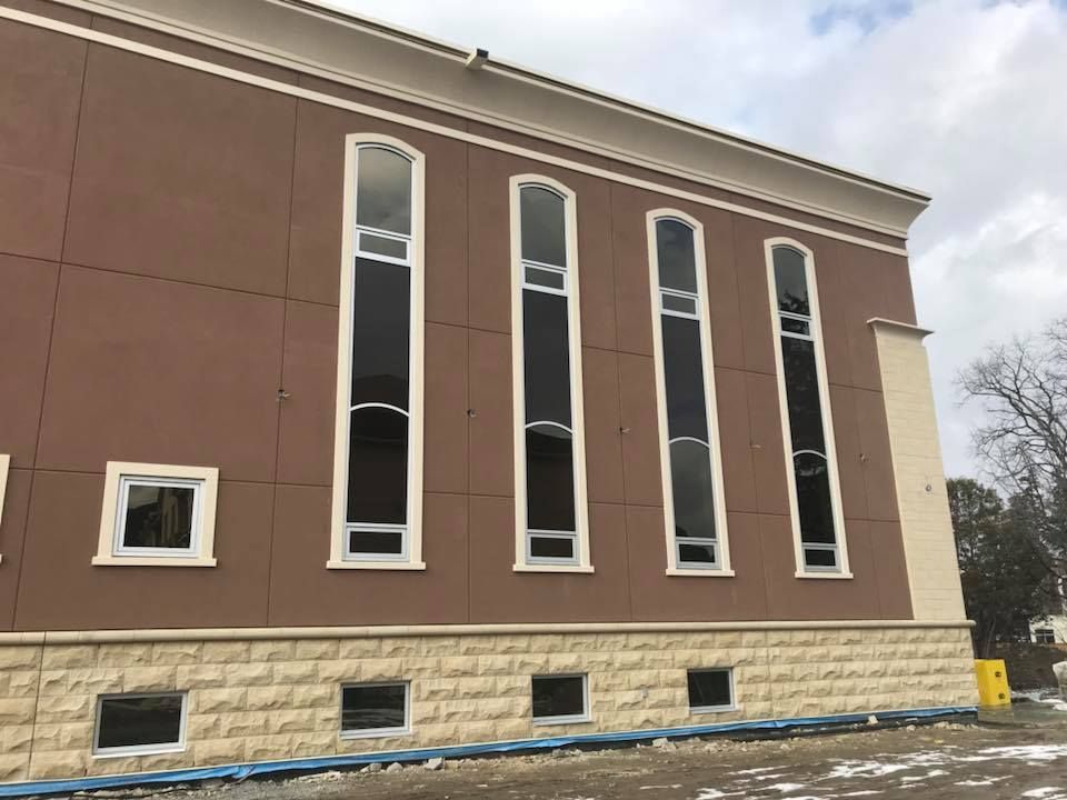 A building with a lot of windows on the side of it