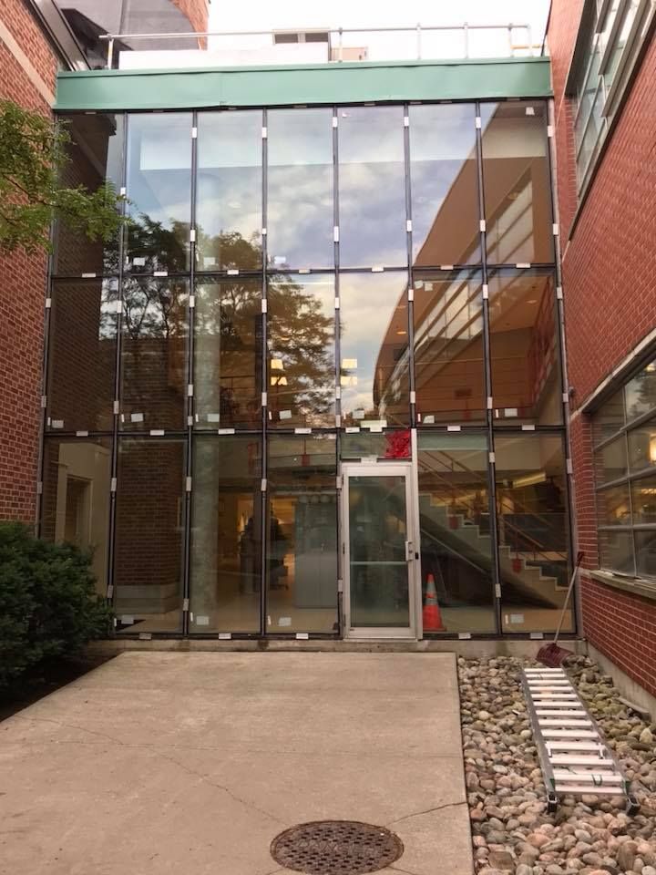 A building with a lot of windows and a door