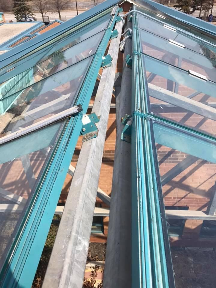 A roof with a lot of glass on it
