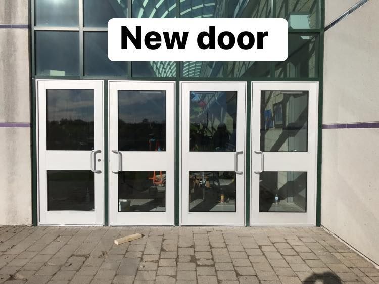 A picture of a new door in a building