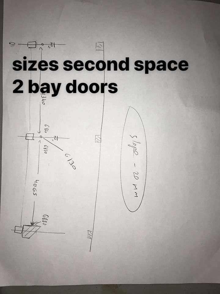 A piece of paper that says sizes second space 2 bay doors