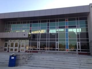 A large building with lots of windows and stairs