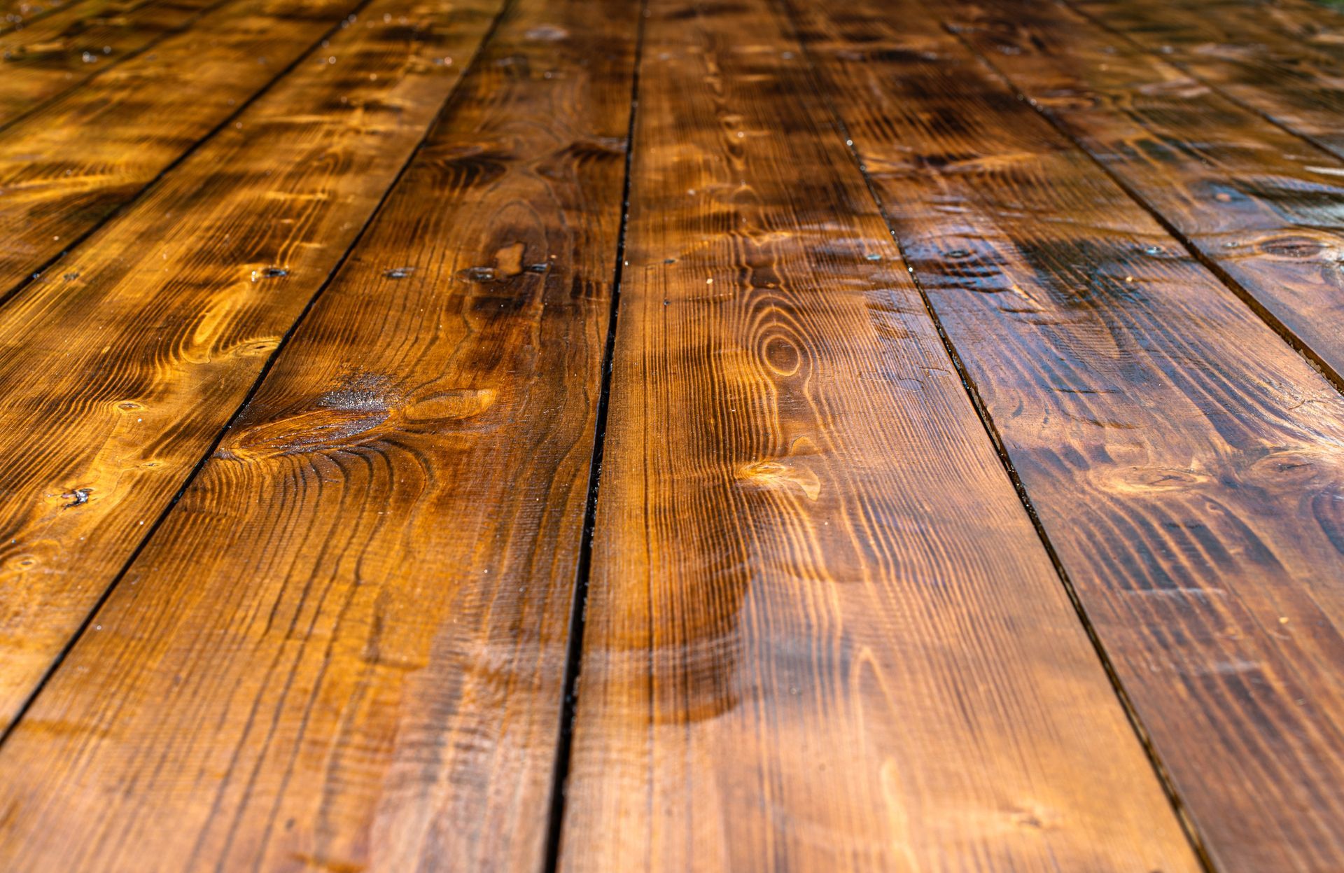 It is a close up of a wooden floor.