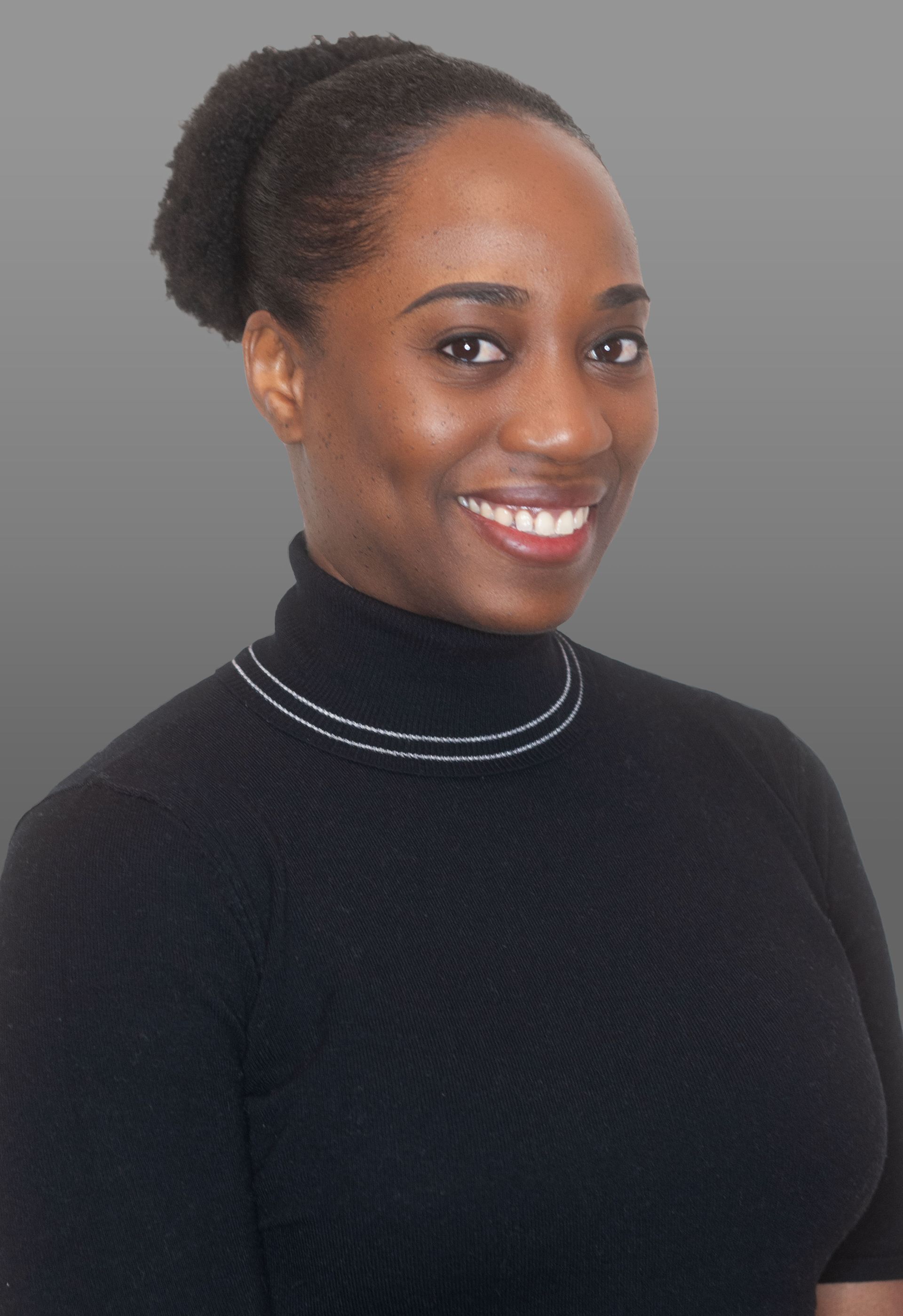 a woman with long hair is smiling for the camera