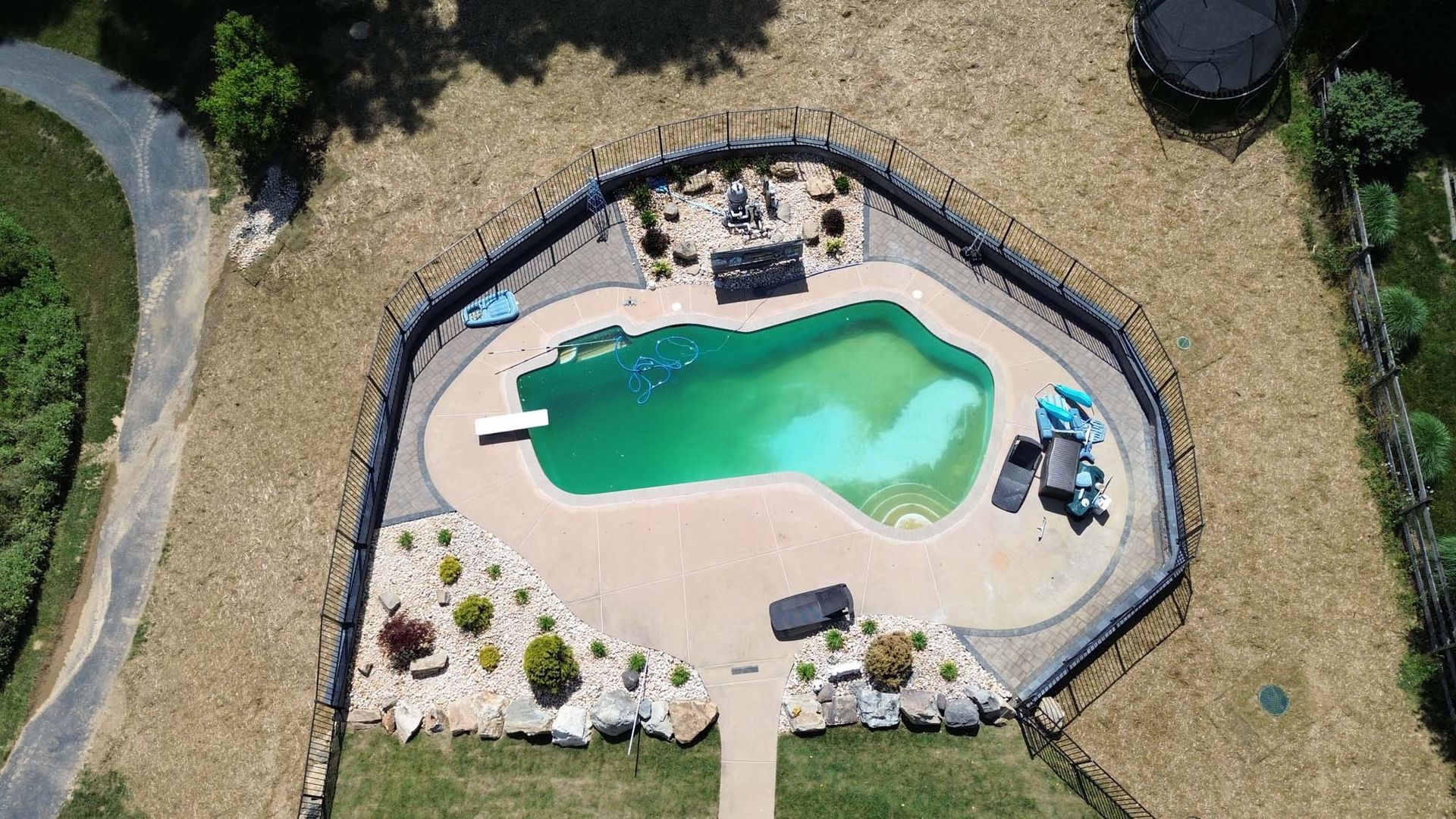 An aerial view of a large swimming pool.