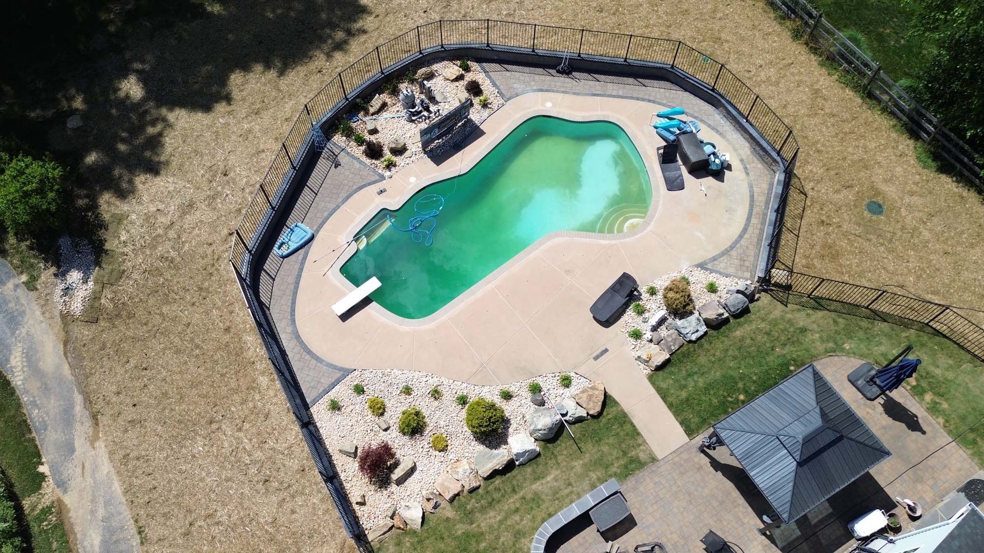 Large swimming pool in a backyard.