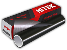 A roll of black window tint next to its branded box. The box features