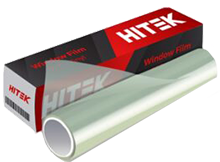 A roll of clear window film with packaging. The box is black, red, and white, labeled