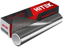 A roll of tinted HITEK window film next to its box, ready for installation.