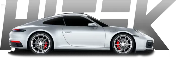 Silver Porsche 911, with red brake calipers, in front of the word
