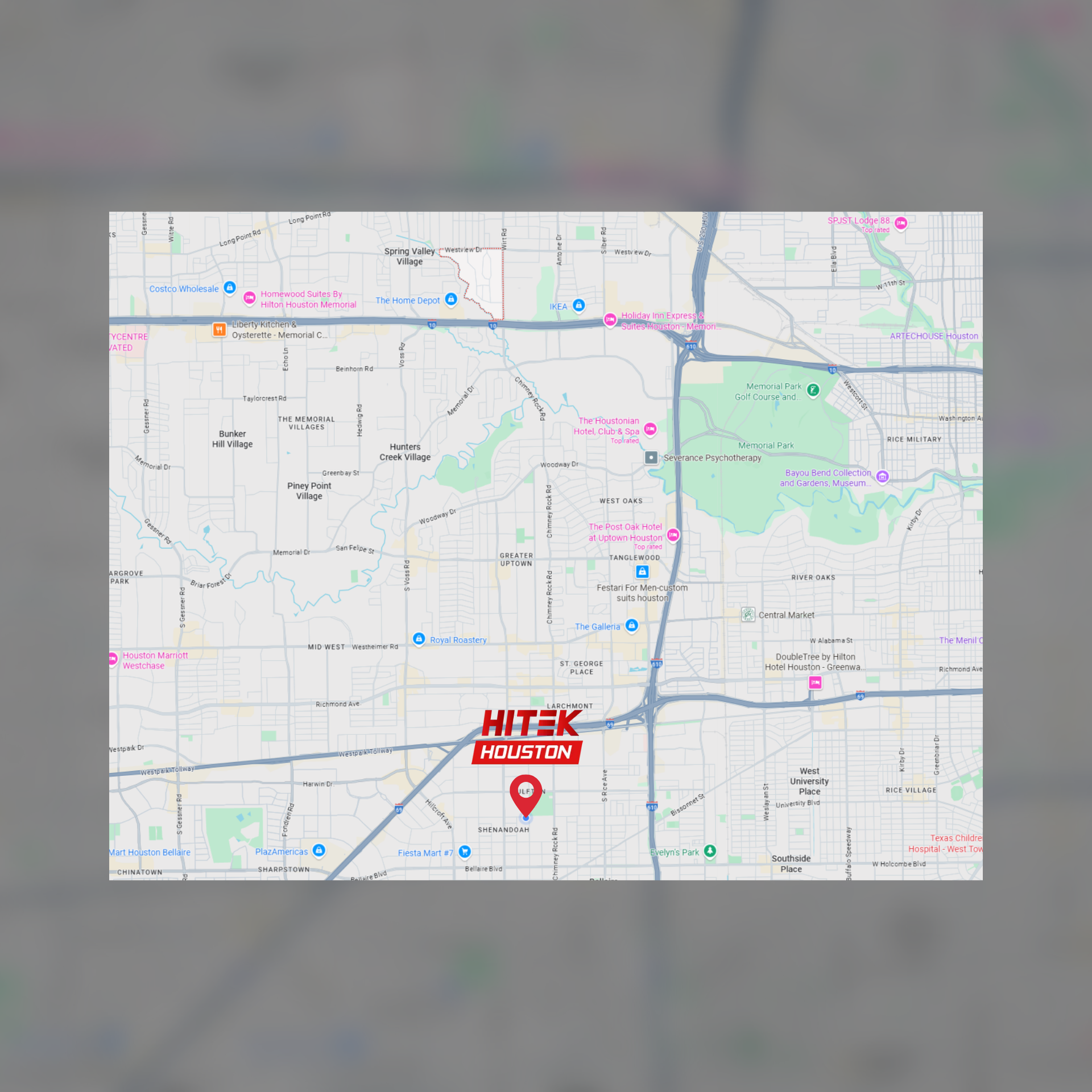 Map showing a red marker for Hitek, a business location, in an urban area.