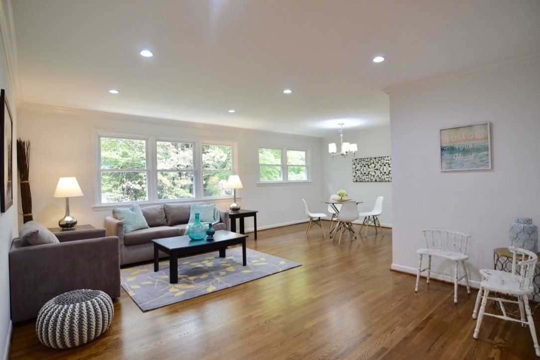 A living room with a couch and a coffee table
