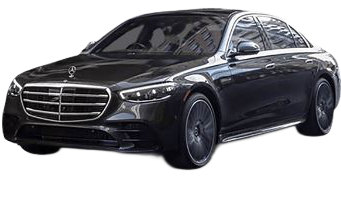 Black Mercedes-Benz S-Class sedan, parked at an angle, with a building reflection in the window.